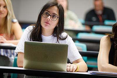 Student working on laptop.